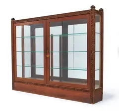 Bookcase by Lockwood de Forest, teak, glass, carved by the Ahmedabad Wood Carving Company, Ahmedabad, India, possibly assembled in New York, sold Oct 2020