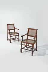Chinese Export, Pair of Armchairs, probably Shanghai, padouk with cane back and seats, each with loose silk upholstered seat cushion