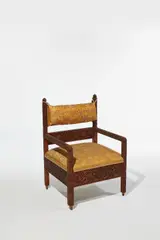 Lockwood de Forest, Armchair, teak, on casters, later silk upholstery, carved by the Ahmedabad Wood Carving Company, Ahmedabad, India