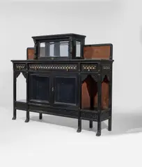 Cabinet by Herter Brothers, carved ebonized wood, mother of pearl and brass inlay, bevelled glass, sold Oct 2020