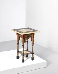 Side table by Carlo Bugatti, circa 1898, Walnut, ebonised walnut, repoussé brass, copper, brass, pewter inlays, sold Oct 2020