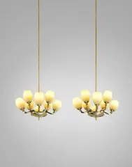 Paavo Tynell, Pair of rare and monumental eight-armed ceiling lights, model no. 1382, from the Finlayson Villa, Julkujärvi, Tampere, Finland, 1949, Amber glass, brass