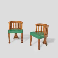 Pair of Councillor's Armchairs by Edward William Godwin, for Greene and King, incised and inlaid oak, leather upholstery with brass close nails and brass castors, sold Dec 2020