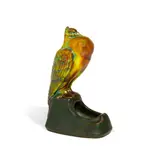 Zsolnay, Perched Pigeon, green, gold and copper eosin glazed earthenware, with the firm's mark on underside