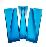 Tadao Ando, Set of Three 'Rosetta', 'Ghiaccio' and 'Velato' 'Ando' Vases, sold together with catalogue and certificate of purchase, for Venini from the edition of thirty, completed in 2015, cast aquamarine glass