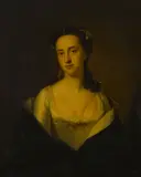 Thomas Hudson, A portrait of a lady in a white dress, half length, wearing pearls, oil on canvas