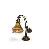 Counterbalance Desk Lamp by Tiffany Studios, patinated bronze, iridized glass, underside of the base stamped '6871 TIFFANY STUDIOS NEW YORK', sold May 2020