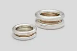 Gianfranco Frattini, Two Bottle Coasters, sterling silver, each stamped '925' and 'M