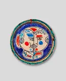 Guerrino Tramonti, Volti, glazed terracotta with a crystalline glaze