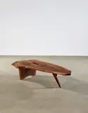 George Nakashima, Conoid Coffee Table, American black walnut, two free edges, two fissures and sap grain detail, ink mark 'Rilly'