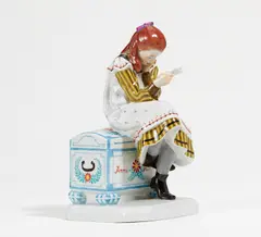 Lesendes Mädchen by Meissen, 1995, Porzellan, farbiges Dekor, sold Nov 2021