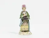Dame mit Muff by Meissen, 1910, Porzellan, farbig und gold staffiert, sold Nov 2022