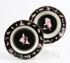 Zwei Teller mit Kindermotiven by Kpm, Porzellan, schwarz, purpur und gold staffiert, sold Jan 2024