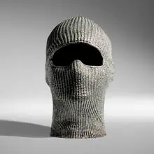 Charles Lutz, Mask II, 2012, cast and polished stainless steel