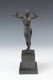Continental School, STANDING CLASSICAL FEMALE NUDE BALANCING ORB ON OUTSTRETCHED ARM, sculpture