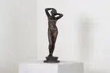 Hamo Thornycroft, Untitled, a bronze study of a nude with her arms raised