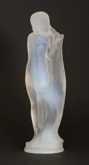 Lucille Sévin, Lucille Sévin (French, 1920, an opalescent glass figure of a nude with flowing hair