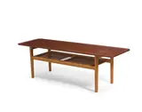 Coffee Table by Hans J. Wegner, model AT 10, for Andreas Tuck, teak, cane, stamped 'FABRRIKAT ANDR TUCK ARKITEKT HANS J WEGNER DENMARK', sold Oct 2019