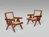 Pair of Easy Chairs by Pierre Jeanneret, teak, cane, together with later upholstered cushions, one example with painted mark 'PSA 59', the other with painted mar, offered Jun 2019