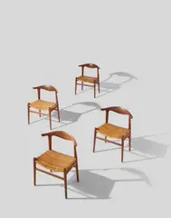 Hans J. Wegner, Set of Four Cow Horn Chairs, model JH505, designed 1952, for Johannes Hansen, teak, cane, remnants of Knoll International paper label to one chair