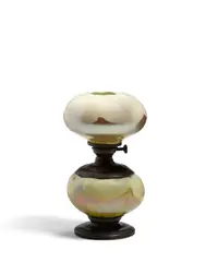 Student Lamp by Tiffany Studios, decorated Favrile glass, patinated bronze, shade inscribed 'S 4309', sold Apr 2019