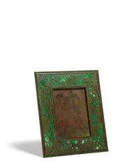 Picture Frame by Tiffany Studios, patinated bronze, Favrile glass, stapmed 'Tiffany Studios New York 947', sold Apr 2019