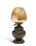 Favrile Glass and Bronze Lamp by Tiffany Studios, Favrile glass, patinated bronze, shade inscribed 'L, sold Apr 2019