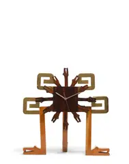 Aztec Clock by Pedro Friedeberg, mahogany stained wood, parcel gilt, offered Apr 2019