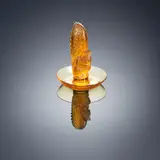 An 'Écureuil' Cendrier, designed in 1931 by René Lalique, amber glass, mould-blown, frosted and polished, sold Feb 2019