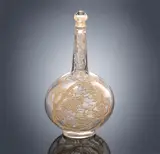 A 'Aubépines' carafe, designed in 1914 by René Lalique, clear glass, mould-blown, frosted and polished, sold Feb 2019