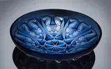 A 'Anges' Bowl, designed in 1930 by René Lalique, blue glass, mould-blown, frosted and polished, sold Feb 2019