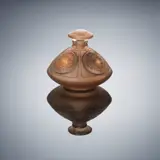 René Lalique, A 'Quatre Soleils' Scent Bottle and Stopper, designed in 1912, clear glass, mould-blown, frosted, and sepia stained