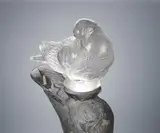 A 'Pigeon Gand' Decorative Motif, designed in 1927 by René Lalique, clear glass, mould-blown, frosted, and polished, sold Feb 2019