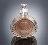 René Lalique, An Early 'Reine Marguerite' Carafe, designed in 1913, mould-blown, frosted and polished, with sepia staining and brown enamelling