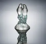 René Lalique, A 'Deux Tourterelles' Paperweight, designed in 1925, clear glass, mould-blown, frosted and polished