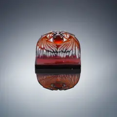 René Lalique, A 'Deux Aigles' Paperweight, designed in 1914, deep amber glass, mould-blown, frosted and polished