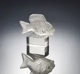 A 'Barbillon' Paperweight, designed by René Lalique, clear glass, mould-blown, frosted and polished, sold Feb 2019