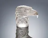 A 'Tête D'Aigle' Car Mascot, designed in 1928 by René Lalique, clear glass, mould-blown, frosted and polished, sold Feb 2019