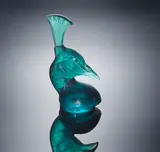 A 'Tête de Paon' Car Mascot, designed in 1928 by René Lalique, turquoise glass, mould-blown, frosted, polished, and with modern presentation case, sold Feb 2019