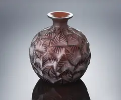 A 'Ormeaux' Vase, designed in 1926 by René Lalique, deep amber glass, mould-blown, frosted and polished, sold Feb 2019