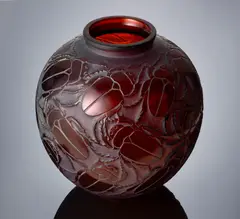 René Lalique, A 'Gros Scarabées' Vase, designed in 1923, deep amber glass, mould-blown, frosted and polished
