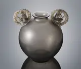 A 'Ronsard' Vase, designed in 1926 by René Lalique, pale topaz glass, mould-blown, applied with a figure to either side, frosted and polished, sold Feb 2019
