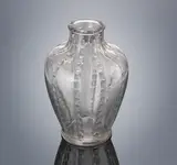 A 'Bandes de Roses' Vase, designed in 1919 by René Lalique, clear glass, mould-blown, frosted and polished, sold Feb 2019