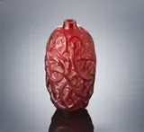 A 'Ronces' vase, designed in 1921 by René Lalique, red glass, mould-blown, frosted and polished, sold Feb 2019