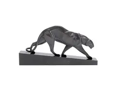 Maurice Prost, An Art Deco Study of a Prowling Panther, circa 1925, patinated bronze, raised off a slanted black marble plinth