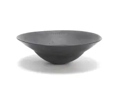 John Ward, A Large 'Helmet' Bowl, textured stoneware with everted rim and fluted on the underside of foot, covered in a black glaze