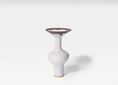 A Bottle Vase by Lucie Rie, circa 1975, porcelain, sold Jun 2019