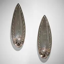 Sconces, pair by André Dubreuil, 1992, silver-plated steel, sold Jan 2024