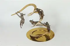 Carla Lavatelli, Down the Slide, Brass and bronze figural table-top kinetic, spring-based sculpture
