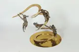 Carla Lavatelli, Down the Slide, Brass and bronze figural table-top kinetic, spring-based sculpture